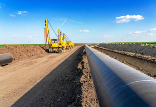 Pipeline with machinery in the background
